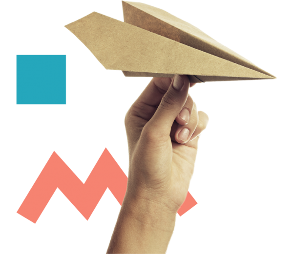 Imagen de una Mano sosteniendo un avión de papel